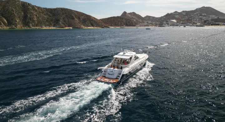 Private 60 ft yacht with outdoor jacuzzi and lounge area.
